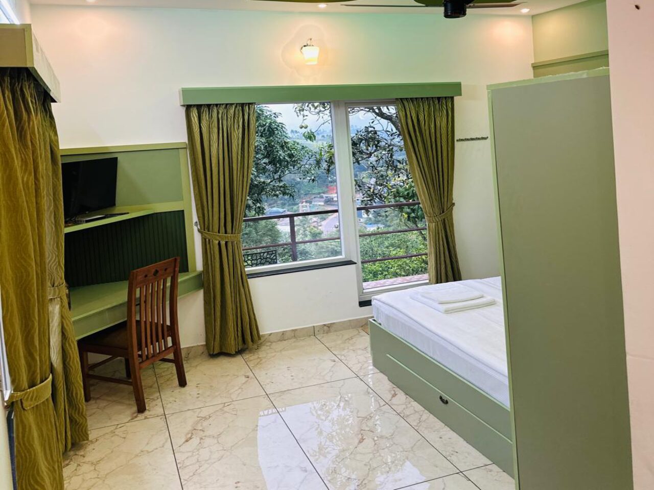 Guest room at GREENSHORE Villa with hill view